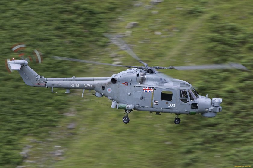 Серебристый вертолет