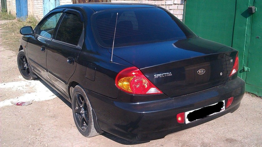 Киа спектра черный жемчуг