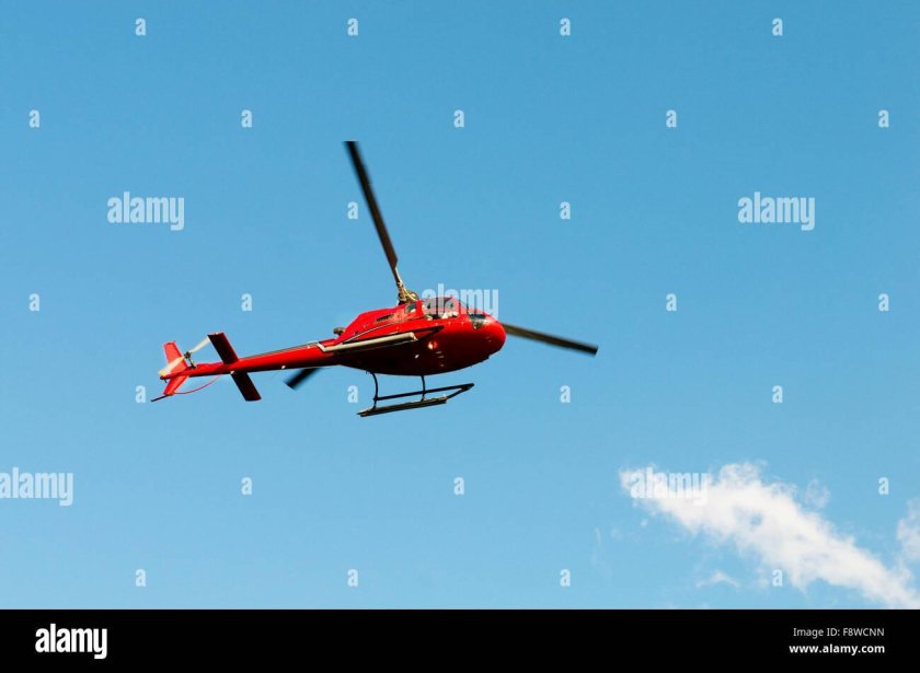 Черный вертолет с красной полосой
