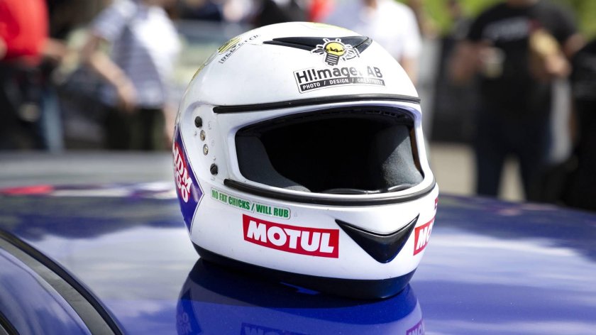 Racing Helmet on car