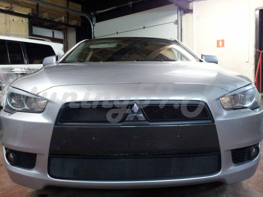 Решетка радиатора Lancer x 2011