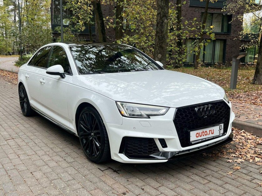 Белая ауди а 4