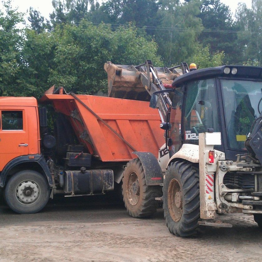 Вывоз мусора КАМАЗ трактор