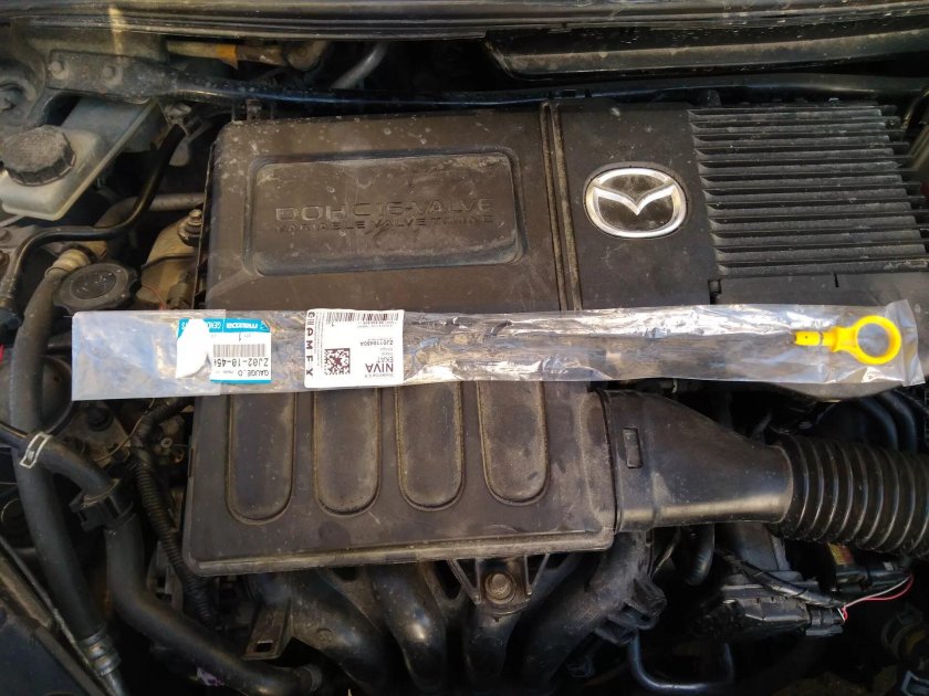 Мазда Демио 2003 масло в двигатель