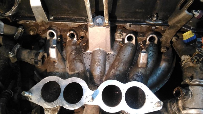 Прокладка под коллектор Нива Шевроле