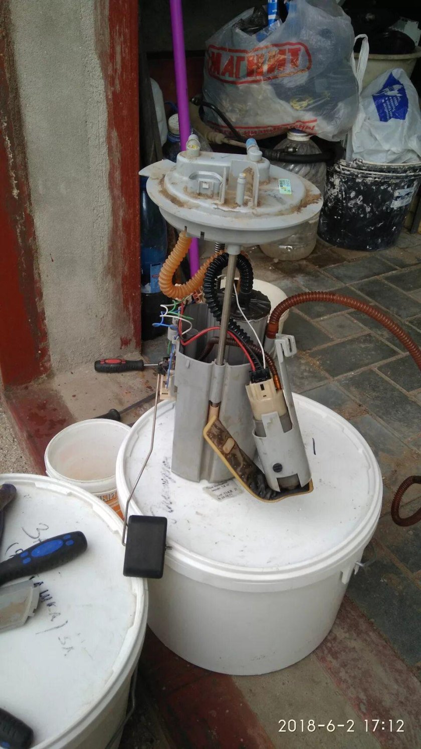 Топливный фильтр Каптива 2.4 с 100