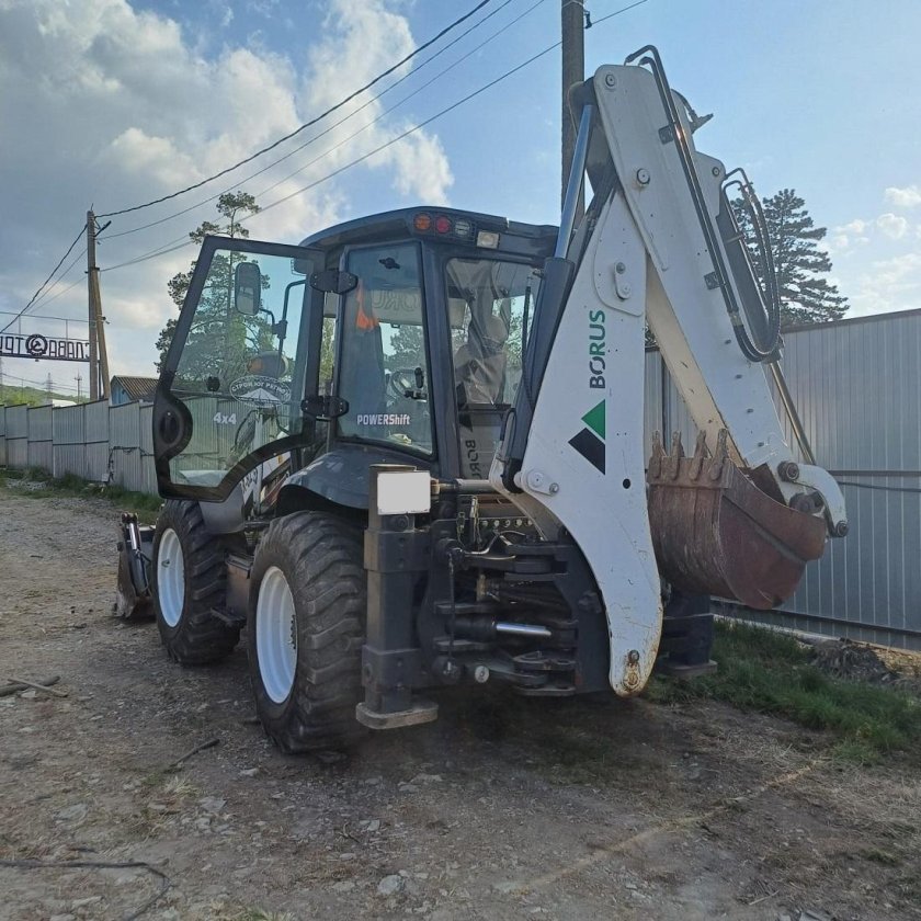 Экскаватор погрузчик терекс 825