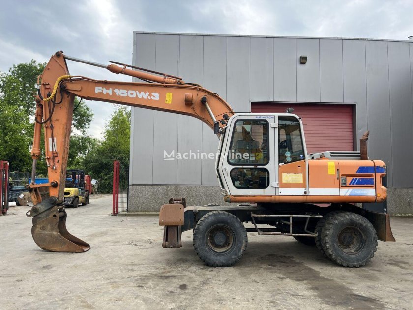 Экскаватор колесный