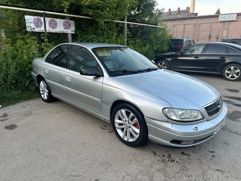 Опель омега 2000