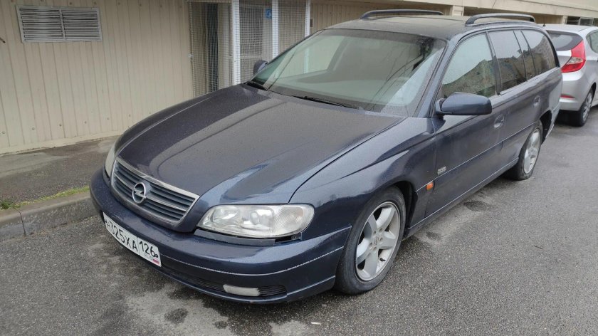 Опель Омега а темно синий