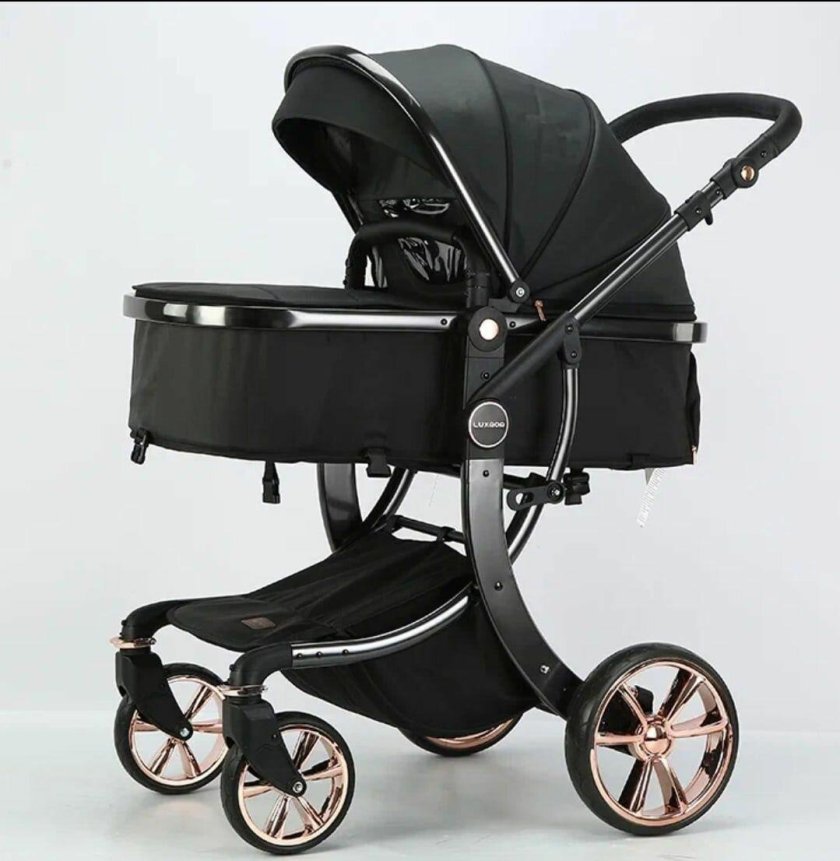 Коляска с черное белым капором luxmom