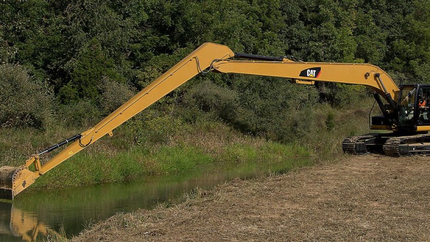 Длиннорукий экскаватор Cat 320