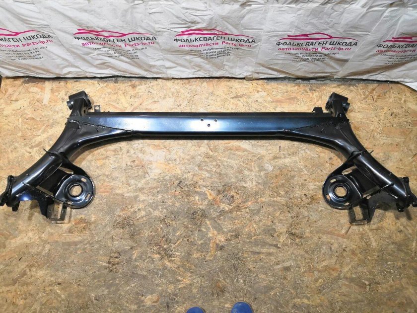 Задняя балка Шкода Рапид