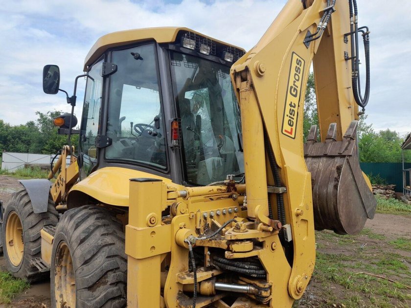 Экскаватор погрузчик катерпиллер