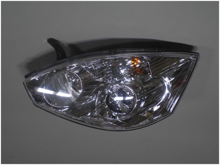 Фара передняя левая Geely Vision 1067000102 25800