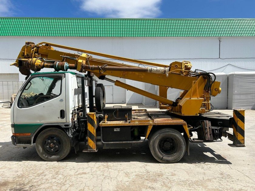 Бурильно крановая машина