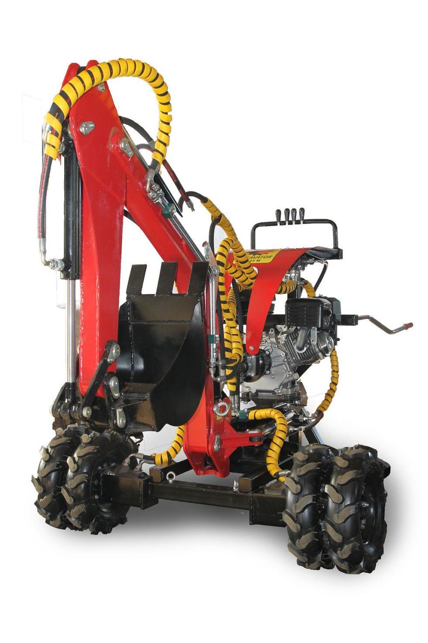 Мини экскаватор прицепной