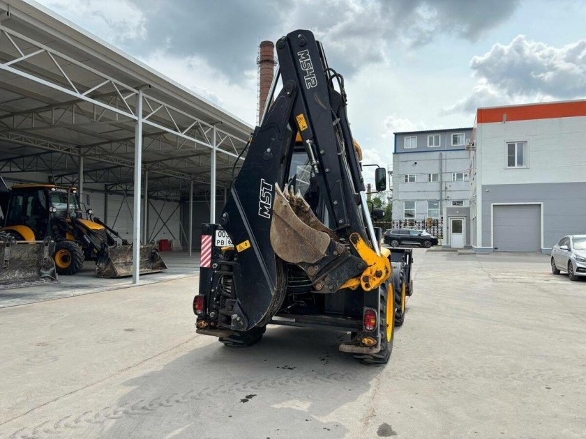 Экскаватор погрузчик mst