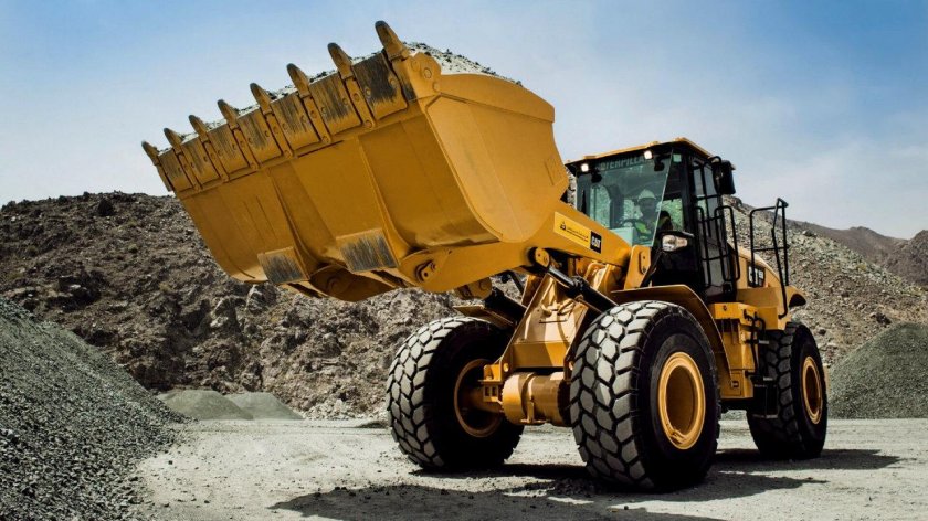 Карьерный фронтальный погрузчик Caterpillar