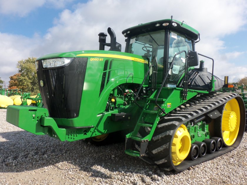 Гусеничный трактор джон дир