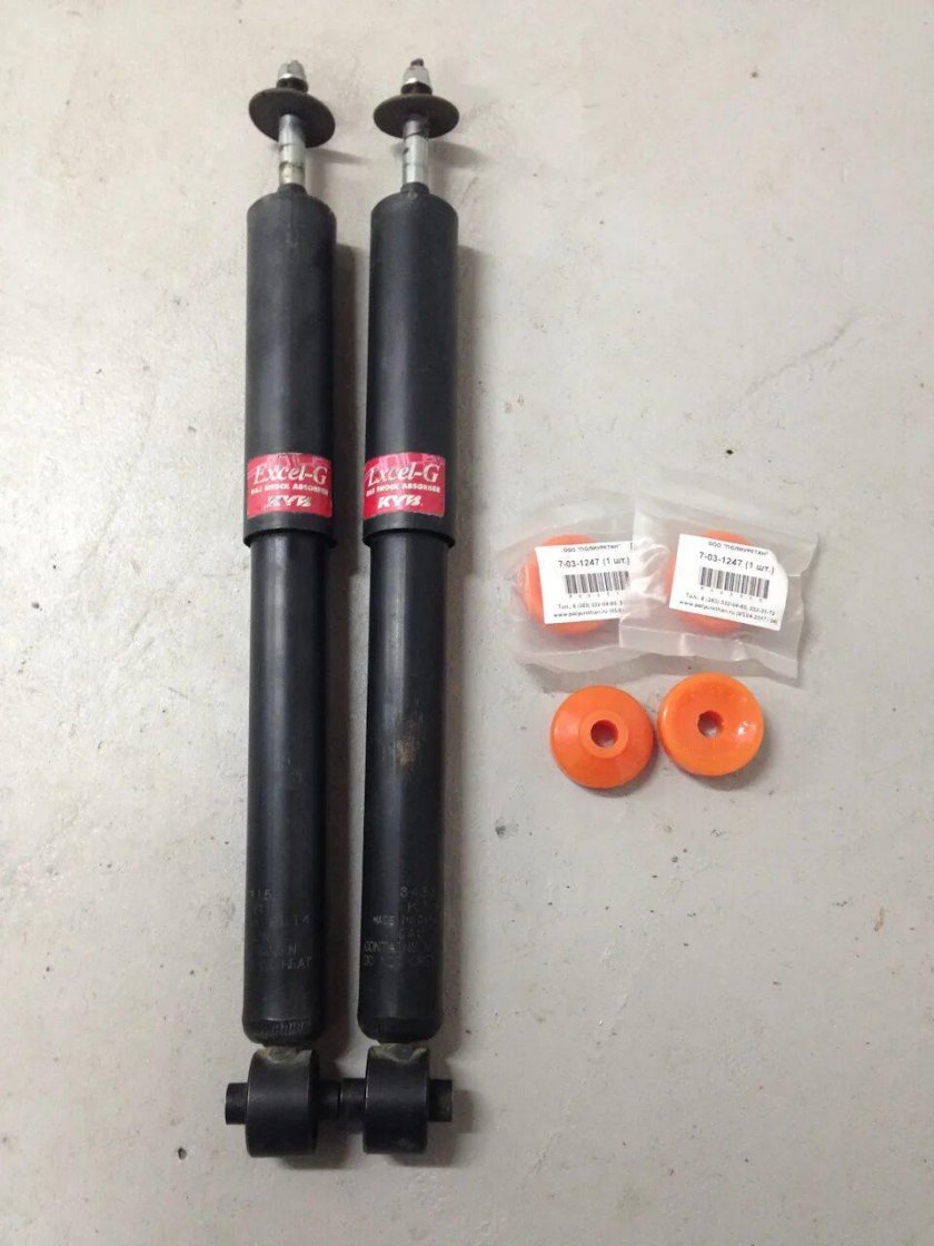 Задние амортизаторы Хонда фит 2002