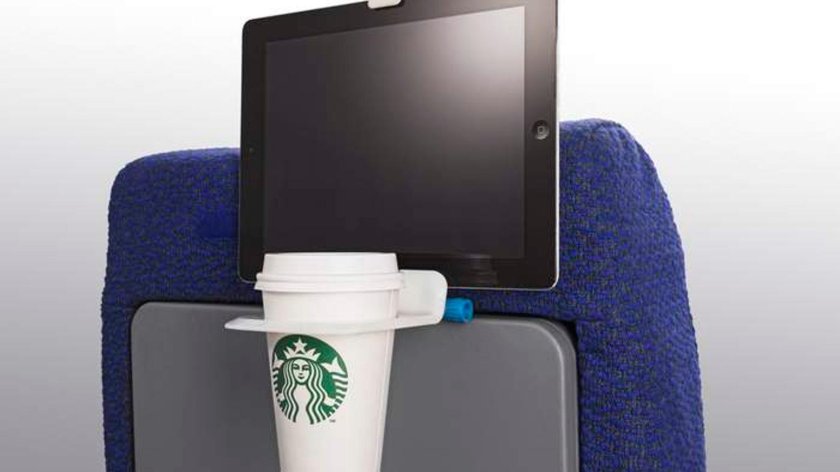 Держатель для телефона в самолете на кресле