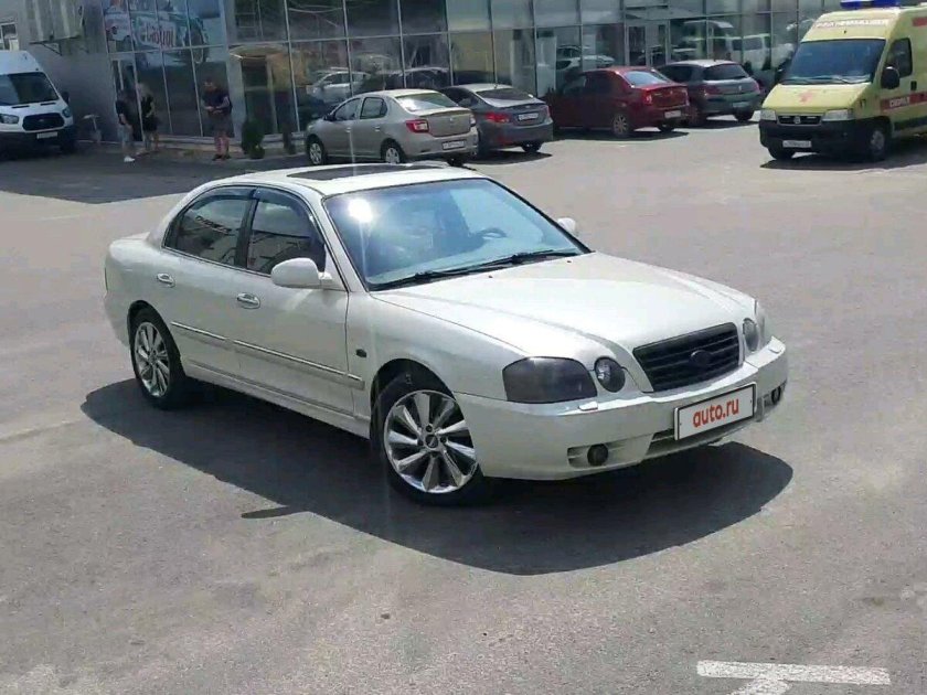 Кия маджентис 2004