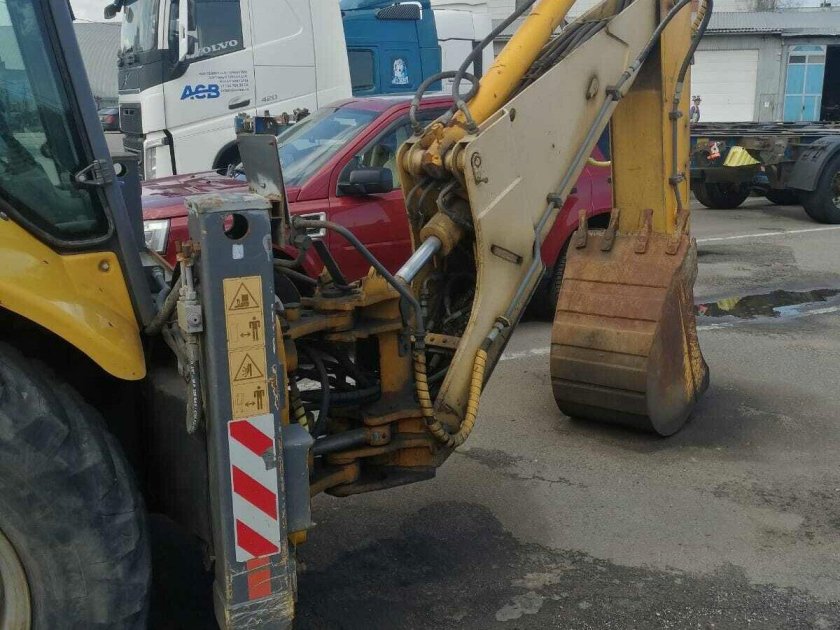 Экскаватор погрузчик катерпиллер 444