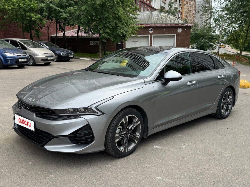 Серая киа к 5