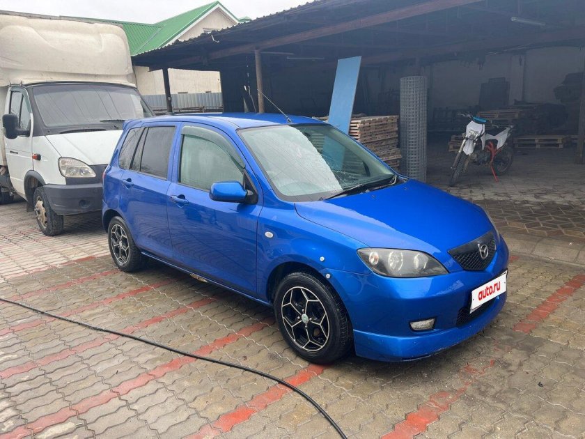 Мазда демио 2002