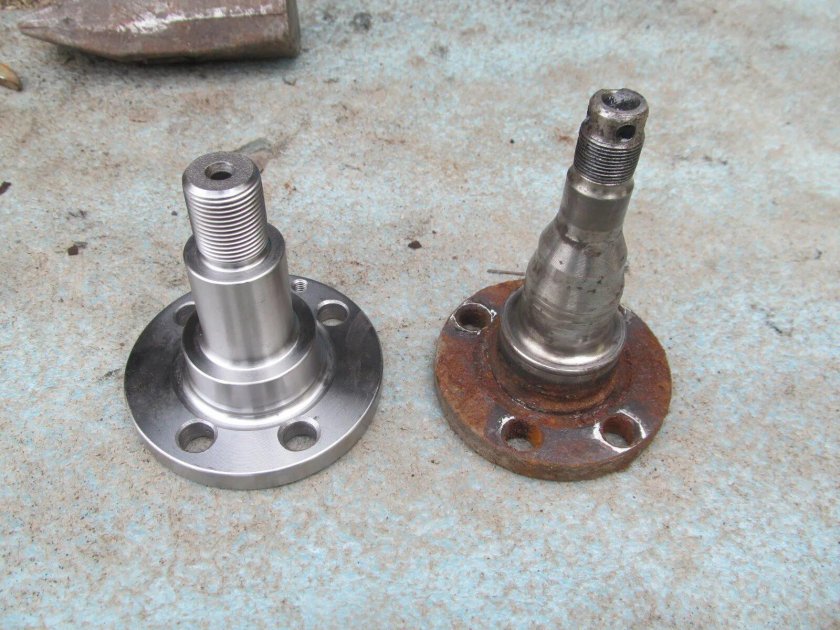 Ось задней ступицы