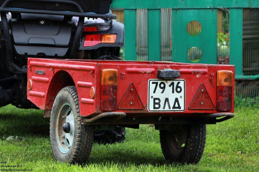 Прицеп енот для мотоцикла