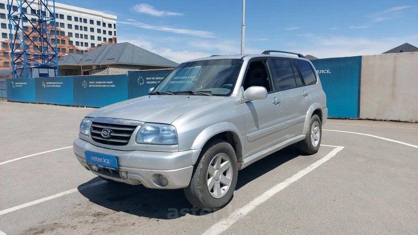 Сузуки Гранд Витара серебристая