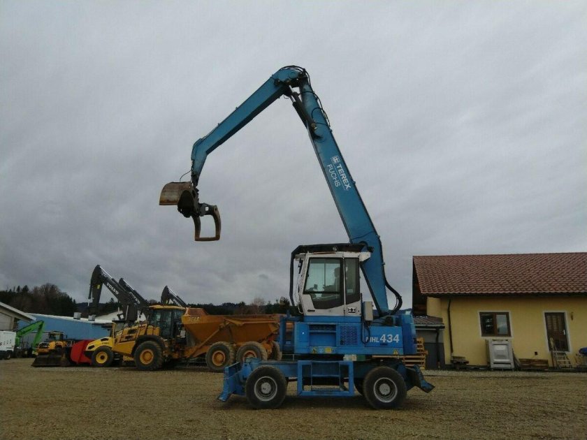 Фукс погрузчик перегружатель