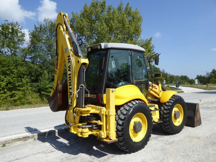 Нью Холланд экскаватор погрузчик 115