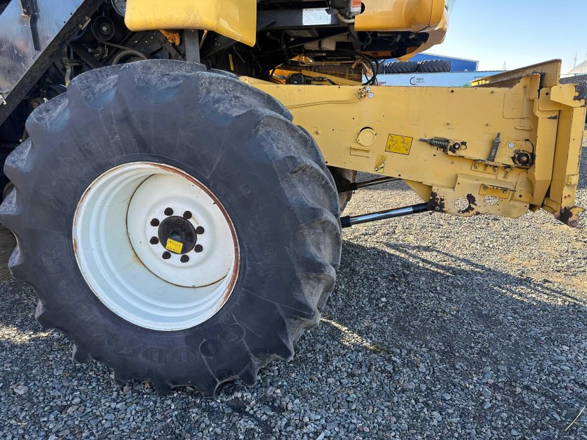 Комбайн нью холланд