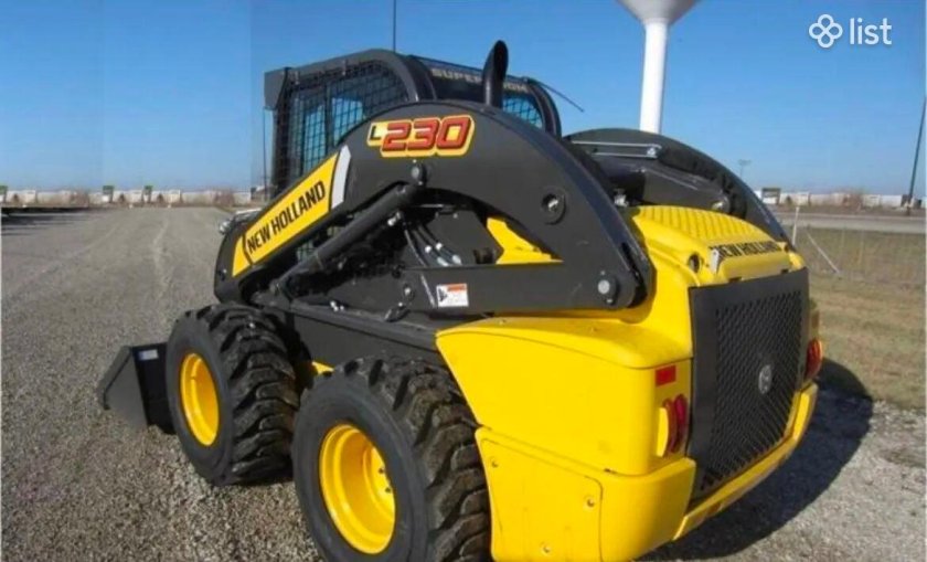 New Holland l230 погрузчик