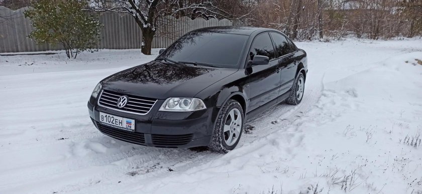 Passat черный металлик