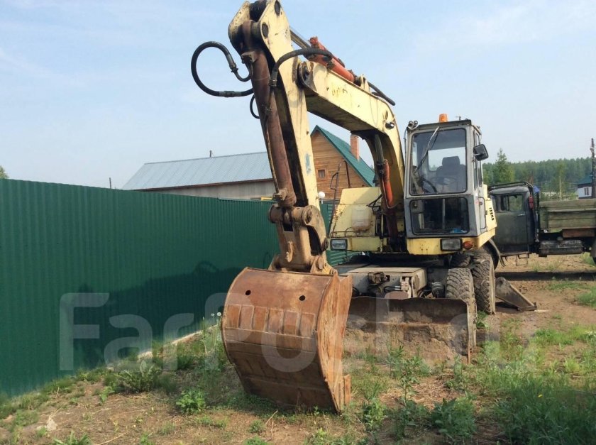 Колесный экскаватор ЭО 3323а