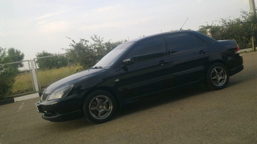 Mitsubishi Lancer 9 черный тонированный