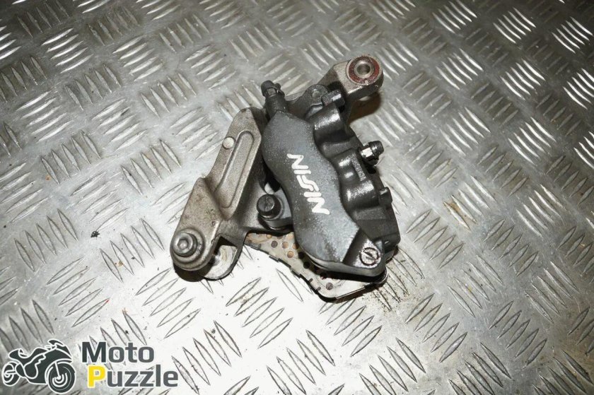 Суппорт тормозной передний левый для