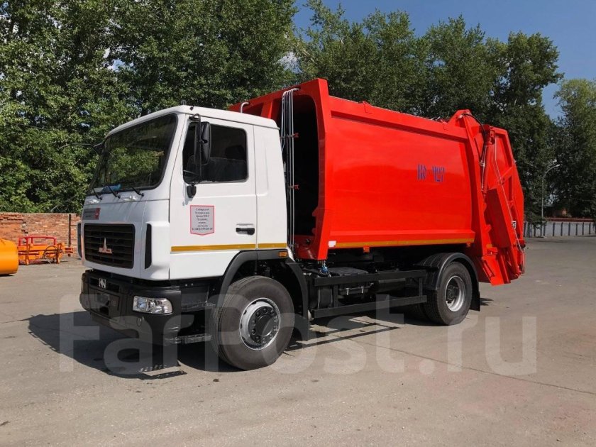 МАЗ ко 427-73 грузит бункер 8 кубов