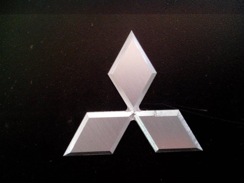 Значок Мицубиси Лансер 10