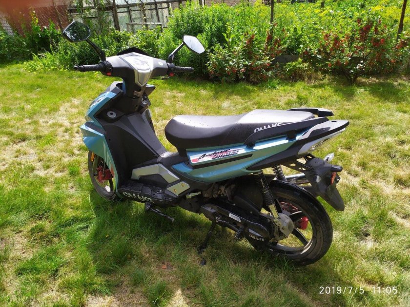 Скутер omaks