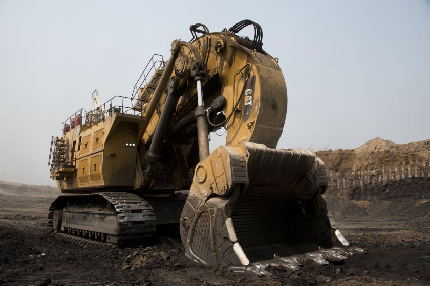 Карьерный экскаватор Катерпиллер