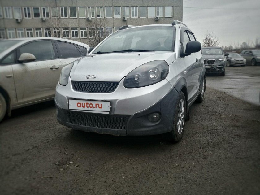 Чери Индис серая