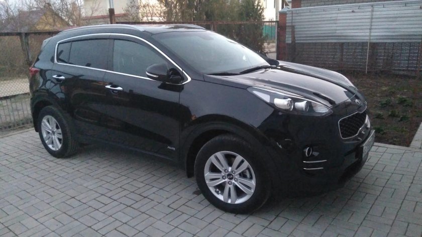 Киа Спортейдж черный перламутр