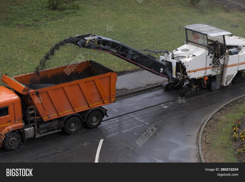 Машина срезающая асфальт