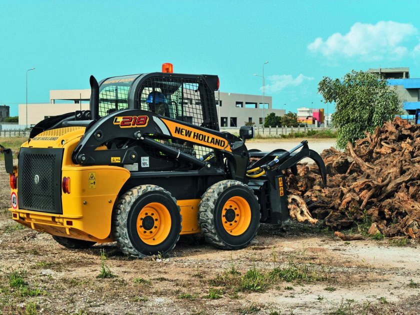 New Holland l218 погрузчик