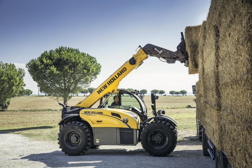 New Holland погрузчик